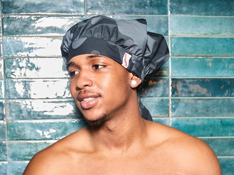 Man wearing the Shower Bonnet Ultra in Black Camo